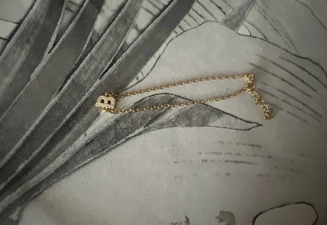 Dainty Initial Chain Bracelet worn by a customer