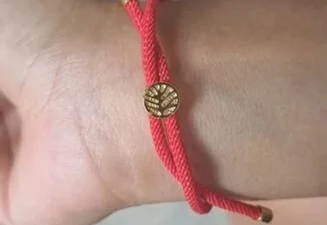 Adjustable Letter Initial Bracelets worn by a customer
