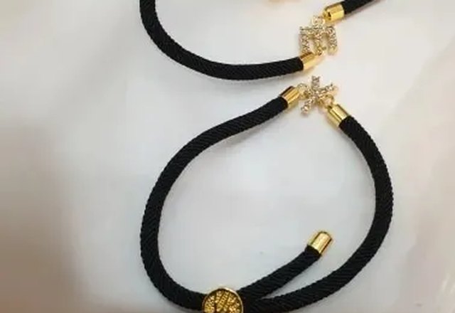 Adjustable Letter Initial Bracelets worn by a customer