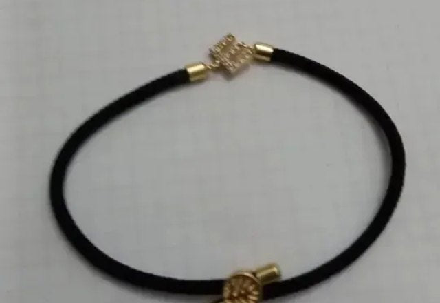 Adjustable Letter Initial Bracelets worn by a customer