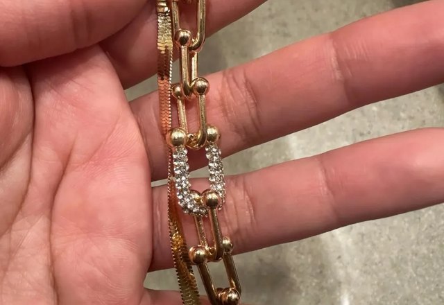 2pc Statement Chain Lock & Herringbone Bracelet worn by a customer