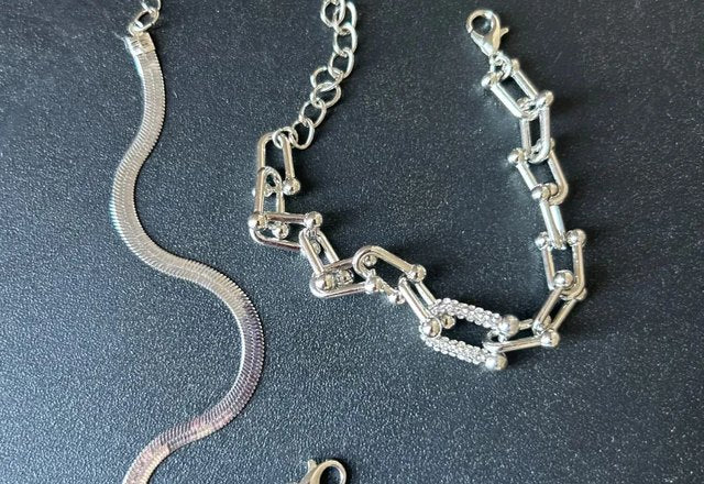 2pc Statement Chain Lock & Herringbone Bracelet worn by a customer