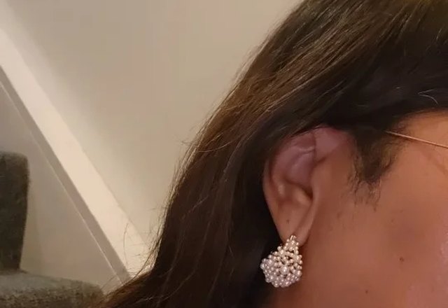 Dainty Statement Pearl Hoop Earrings worn by a customer