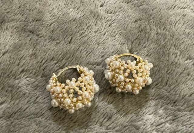 Dainty Statement Pearl Hoop Earrings worn by a customer