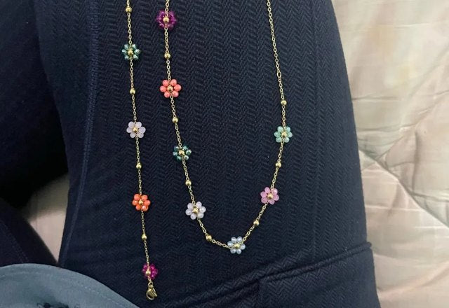Dainty Spring Floral Jewelry Collection worn by a customer