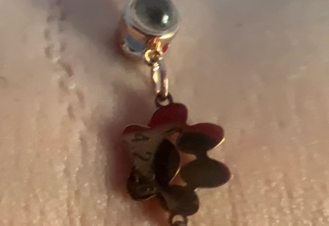 Personalized Birth Flower Bracelet worn by a customer